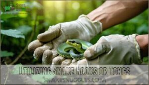 utilizing snake hooks or tongs