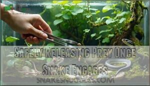 safely releasing prey once snake engages