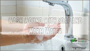wash wound with soap and warm water