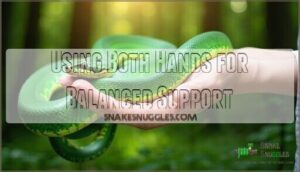 using both hands for balanced support